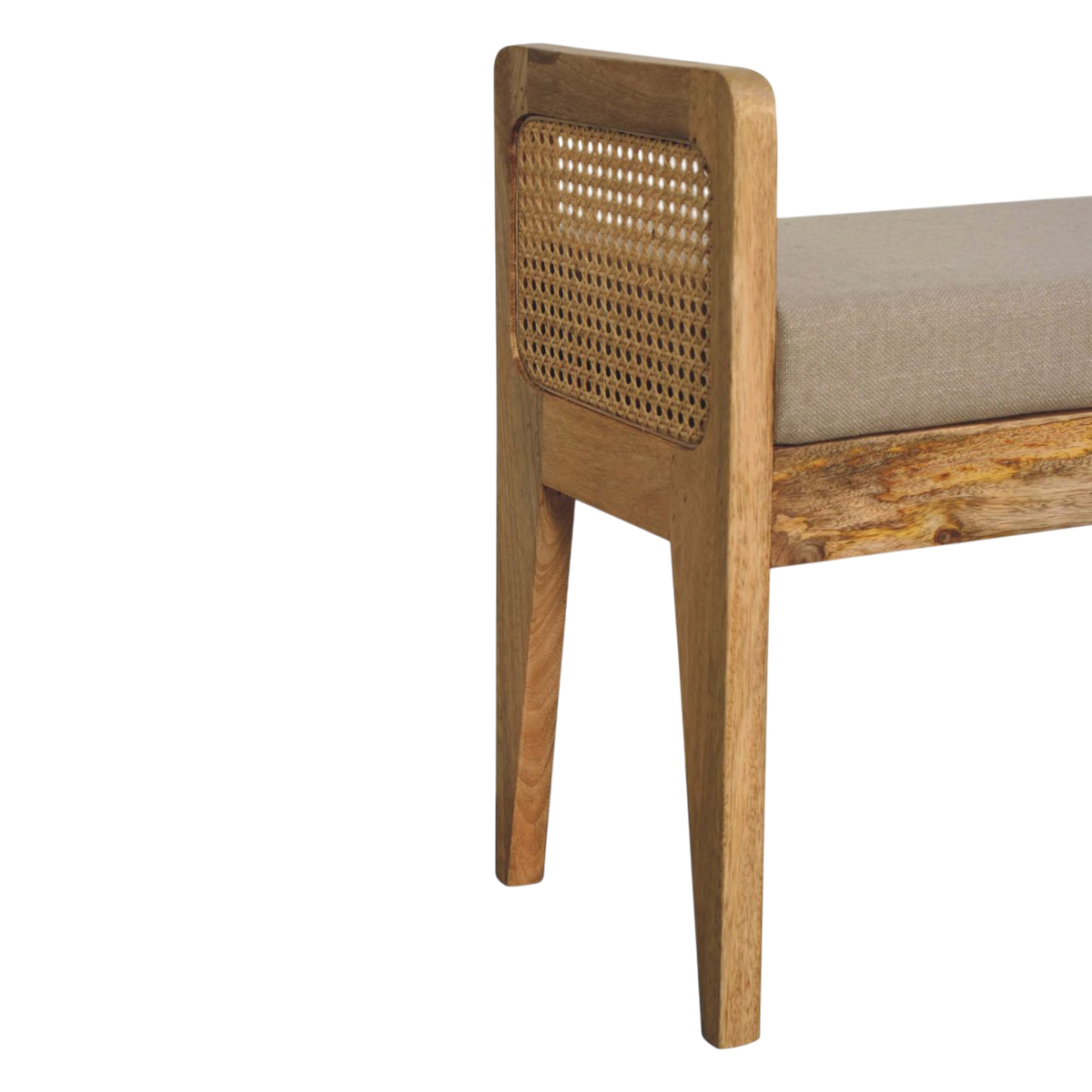Close view of the frame on the Comporta Rattan-Sided Bench in Clay Linen with Natural Rattan.