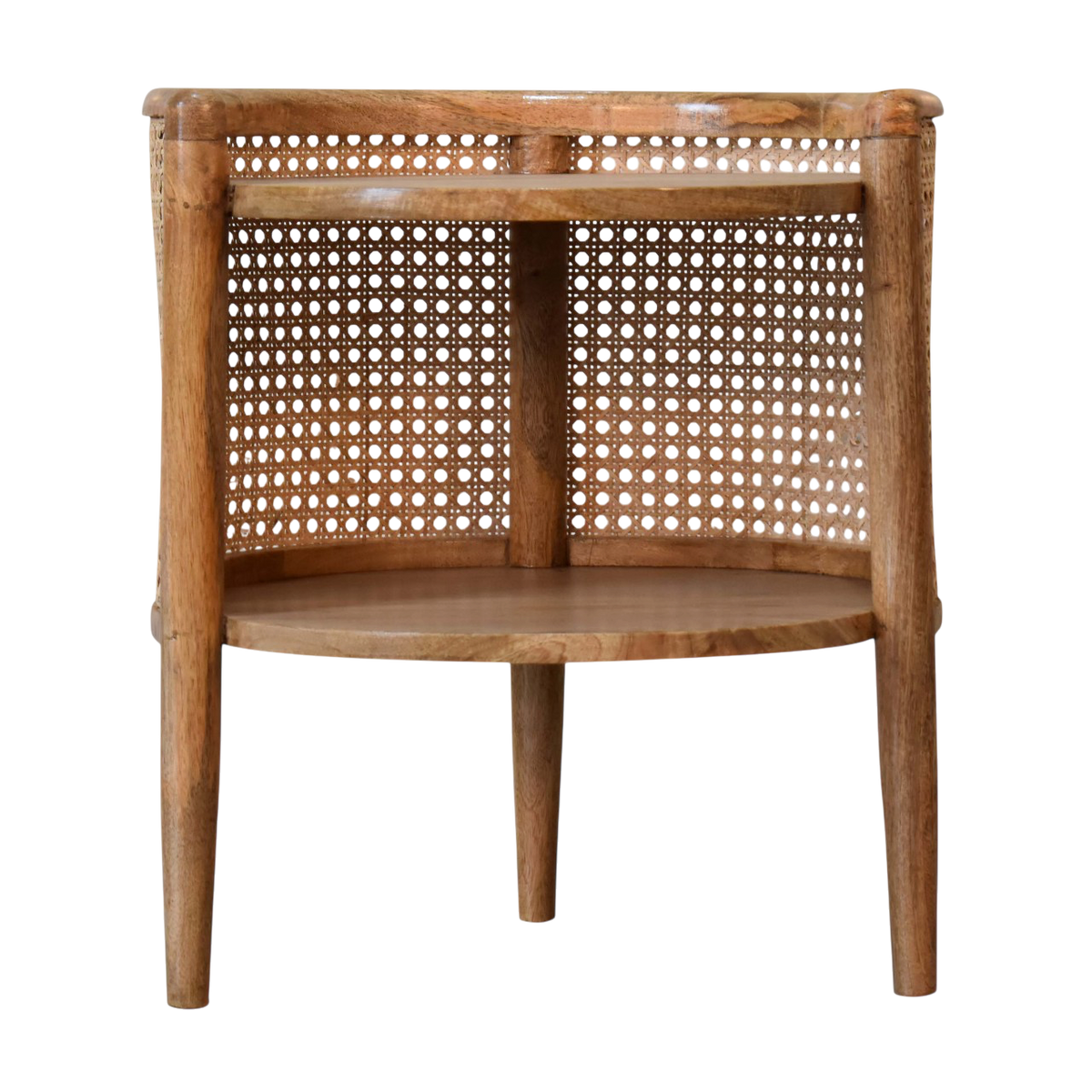 Comporta Round Bedside Table in Amber with Natural Rattan, front view. 100% solid hardwood in a warm amber finish, round body, woven rattan surround, two circular drawers.
