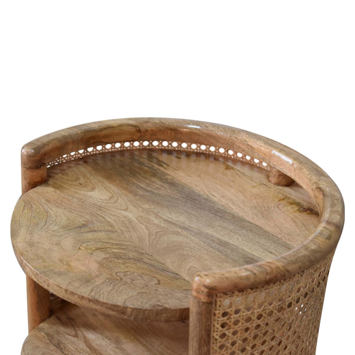 Close view of the woven panels on the Comporta Round Bedside Table in Amber with Natural Rattan.