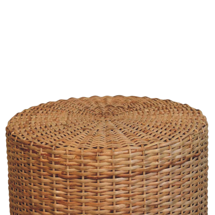 Close view of the weave on the Comporta Round Woven Stool in Amber.