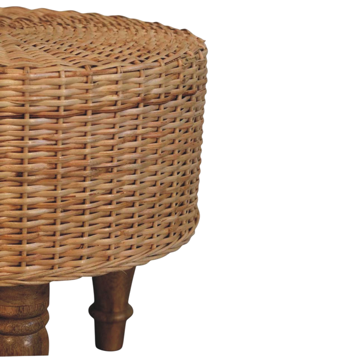 Close view of the legs on the Comporta Round Woven Stool in Amber.