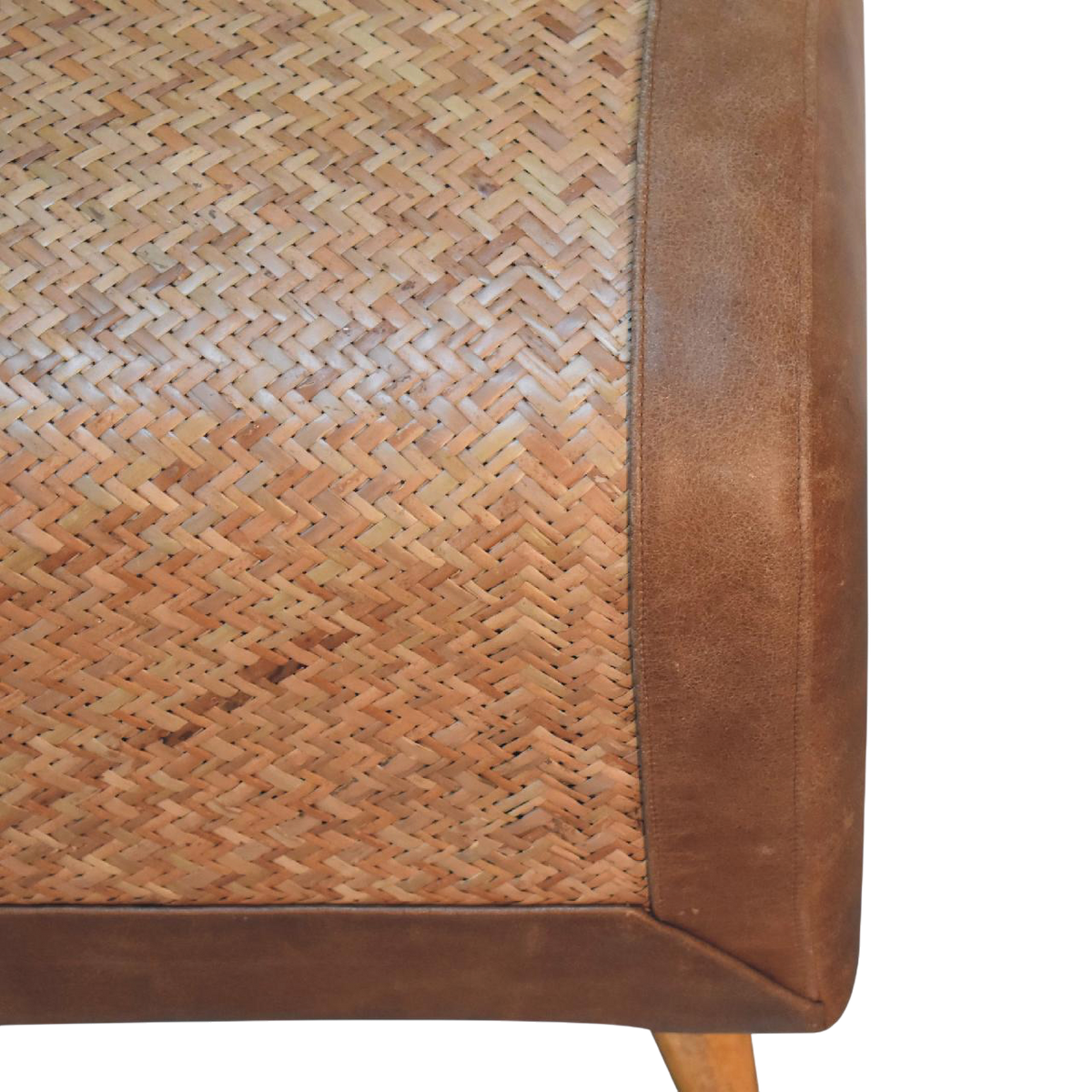 Close view of the weave on the Comporta Square Footstool in Natural Seagrass with Tobacco Leather.