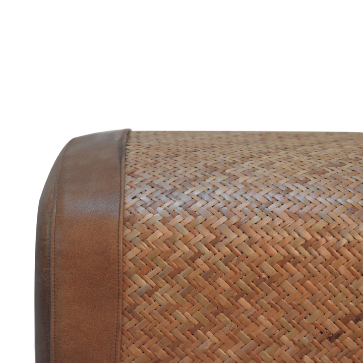 Close view of the seat on the Comporta Square Footstool in Natural Seagrass with Tobacco Leather.