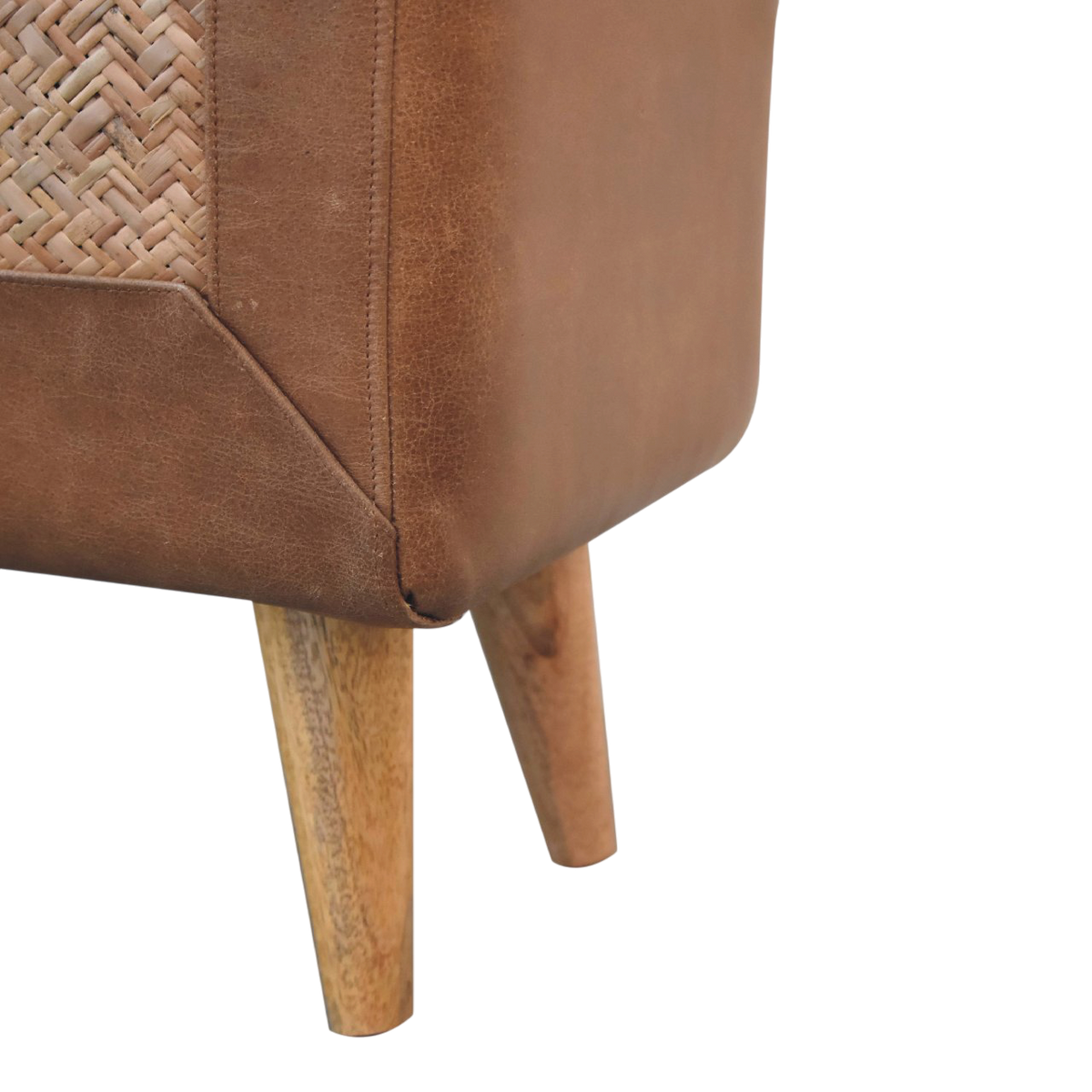 Close view of the legs on the Comporta Square Footstool in Natural Seagrass with Tobacco Leather.