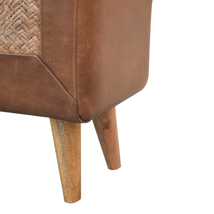 Close view of the legs on the Comporta Square Footstool in Natural Seagrass with Tobacco Leather.