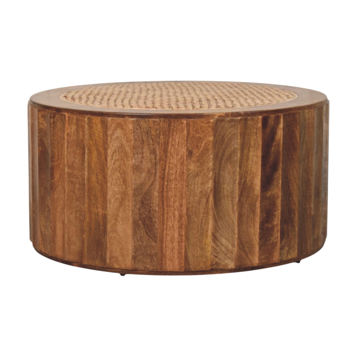Comporta Woven Coffee Table in Amber with Natural Rattan, front view. Solid hardwood base in an amber finish, round silhouette, finely woven inset top.