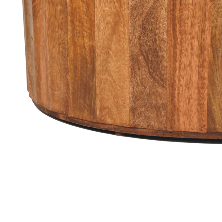 Close view of the base on the Comporta Woven Coffee Table in Amber with Natural Rattan.