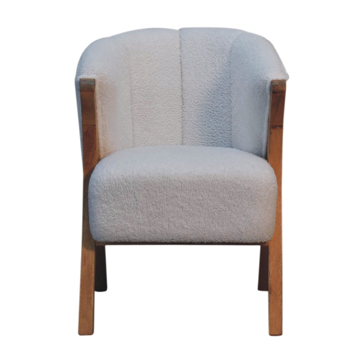 Delano Bouclé Lounge Chair in Chestnut and Alabaster Bouclé, front view. Boucle on an angled hardwood frame.