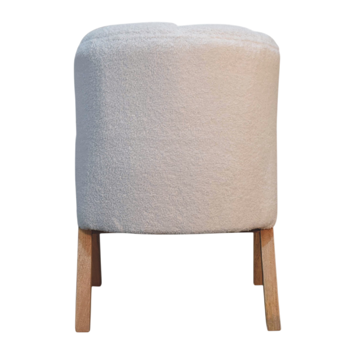 Delano Bouclé Lounge Chair in Chestnut and Alabaster Bouclé, viewed from the back.
