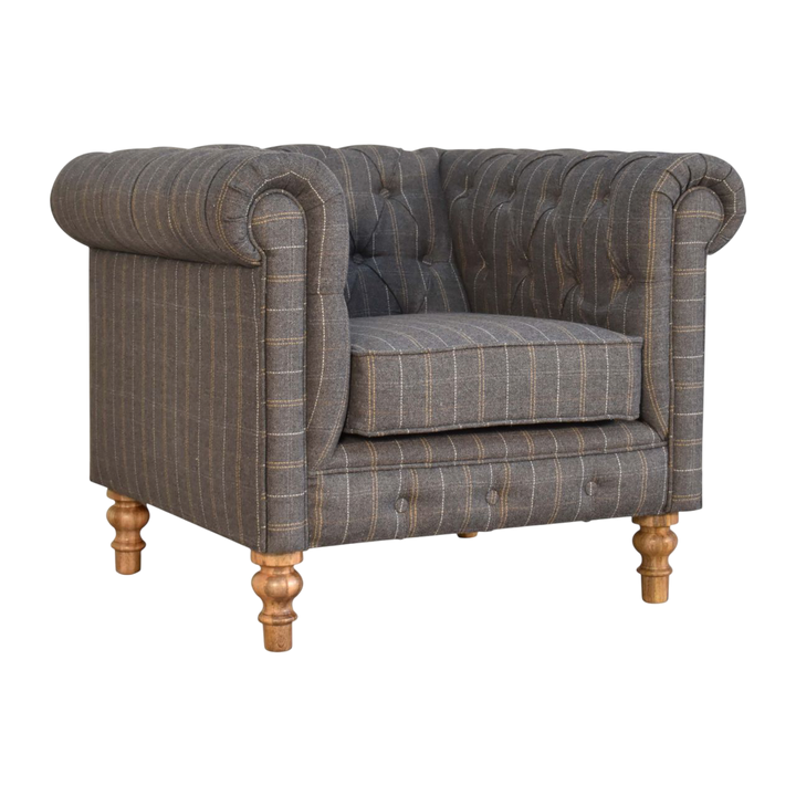 Fitzroy Chesterfield Armchair in Dove Tweed, three-quarter view showing the full profile.