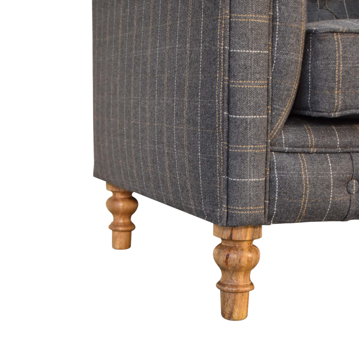 Close view of the legs on the Fitzroy Chesterfield Armchair in Dove Tweed.
