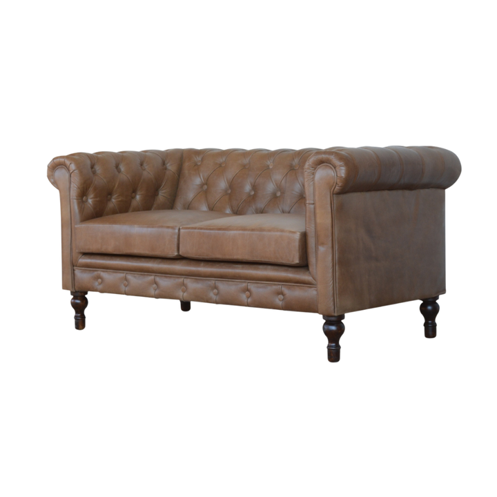 Fitzroy Chesterfield Loveseat in Tobacco Leather, three-quarter view showing the arm roll and seat depth.