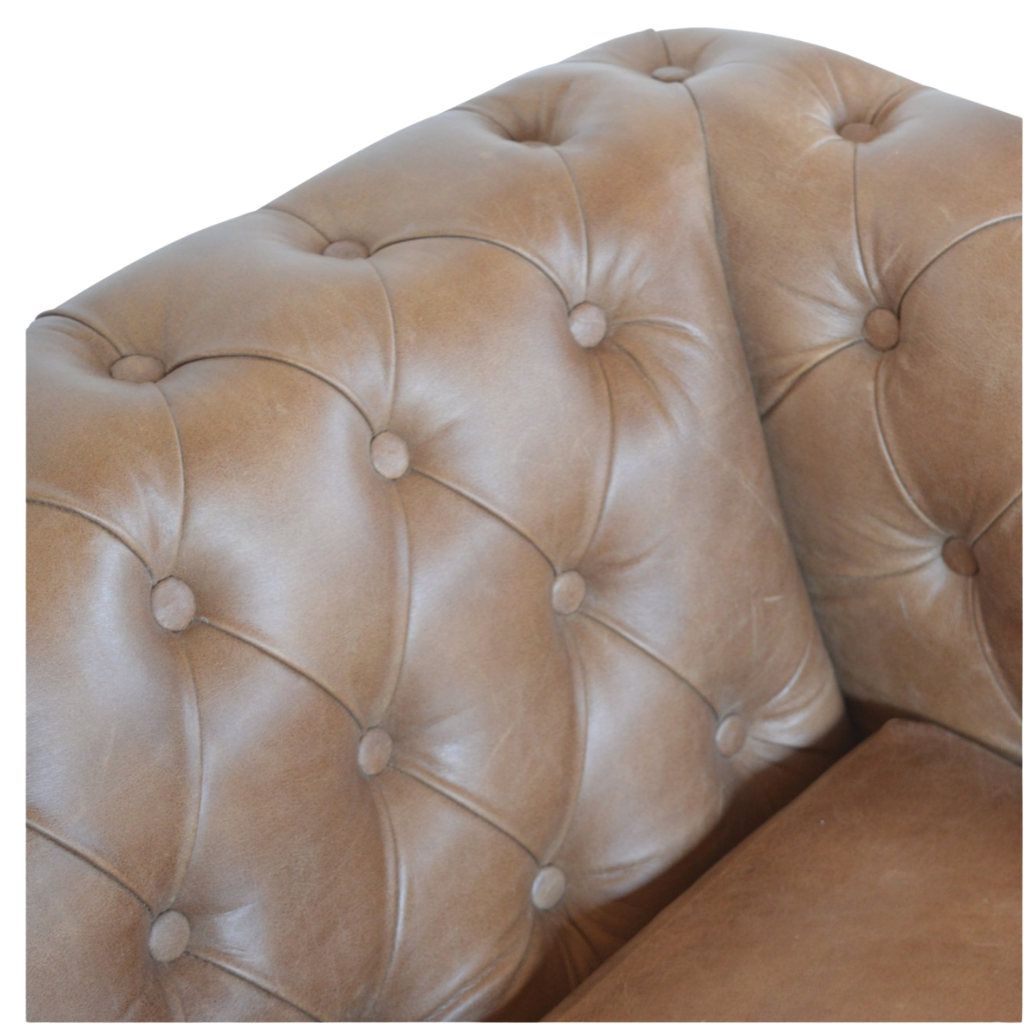 Close view of the seat cushion and leather grain on the Fitzroy Chesterfield Loveseat.