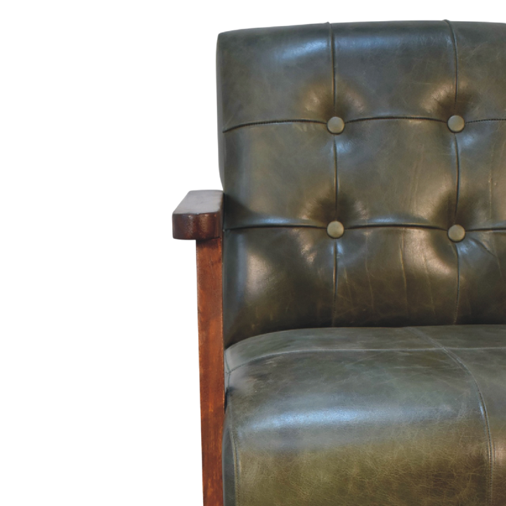 Close view of the buttoning on the Fitzroy Leather Armchair in Olive Leather.