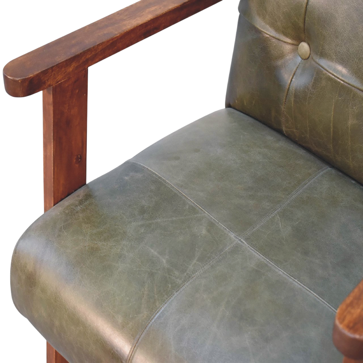 Close view of the arm on the Fitzroy Leather Armchair in Olive Leather.