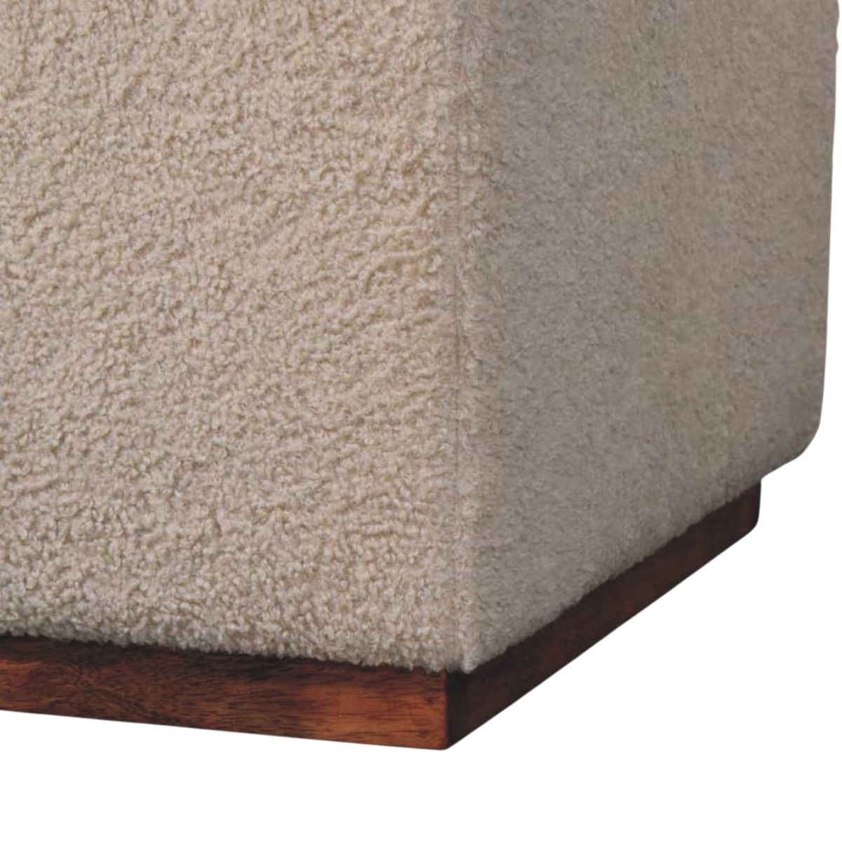 Close view of the boucle upholstery on the Gramercy Cocktail Bench in Chestnut and Cream Bouclé.