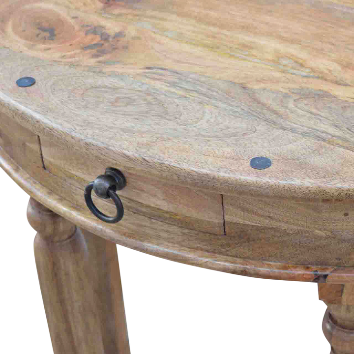 Close view of the brass hardware on the Grosvenor Demilune Console Table in Amber.