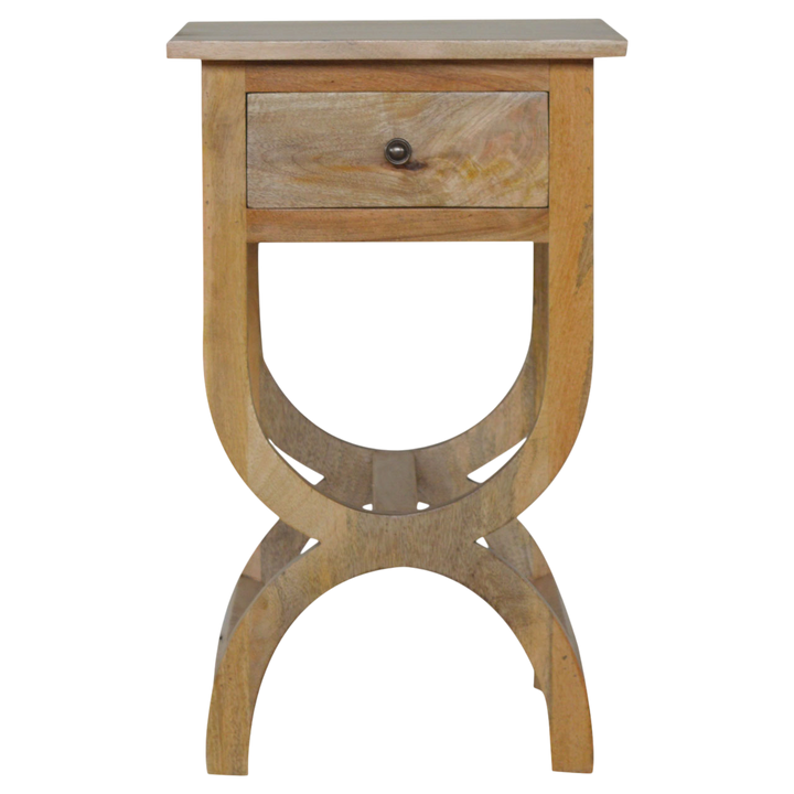 Grosvenor Serpentine Bedside Table in Amber, front view. 100% solid hardwood in a warm amber finish, one drawer, round knob, serpentine curved feet, braced undercarriage.