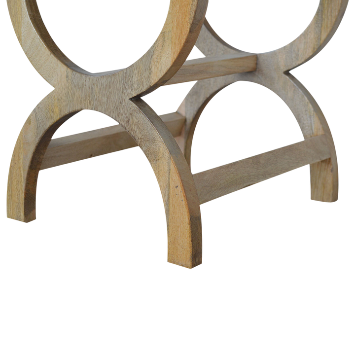 Close view of the base on the Grosvenor Serpentine Bedside Table in Amber.