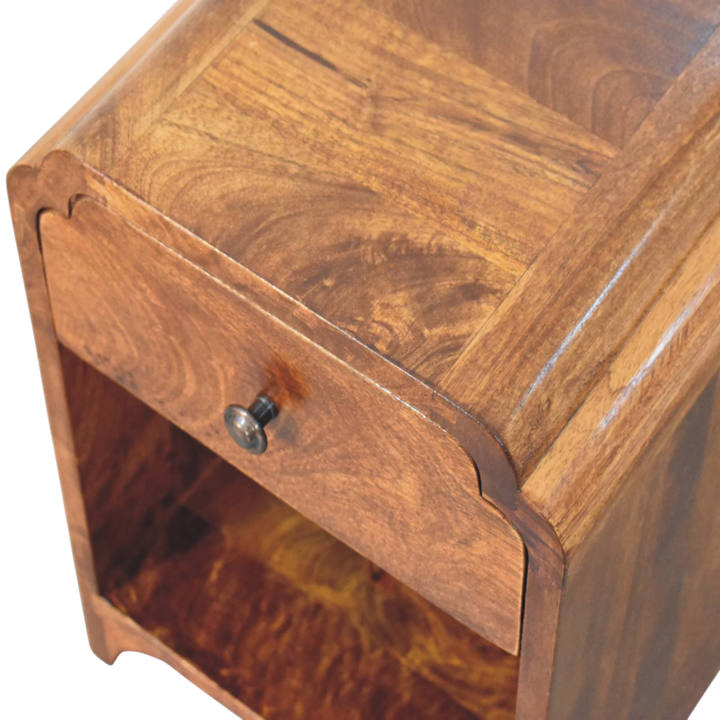 Close view of the carved detailing on the Hadley Mini Bedside Table in Chestnut.