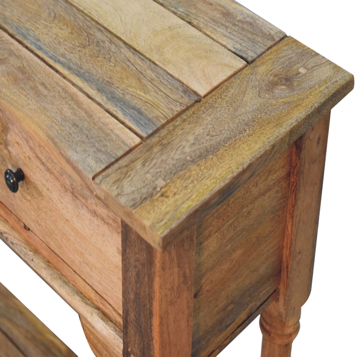 Close view of the top on the Haldon 2-Drawer Console Table in Driftwood.