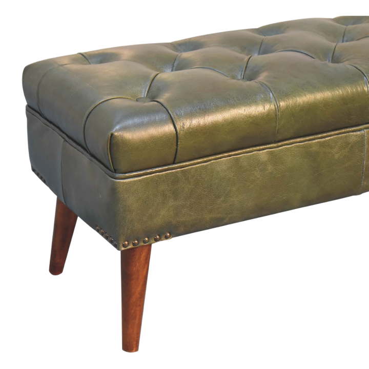 Close view of the turned legs on the Haldon Bench in Olive Leather.