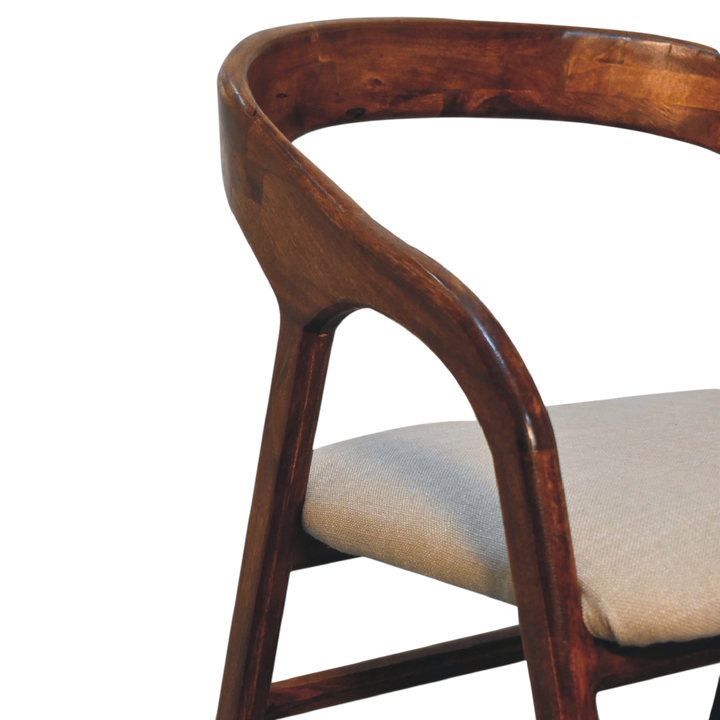 Close view of the frame on the Hampstead Deco Chair in Clay Linen.