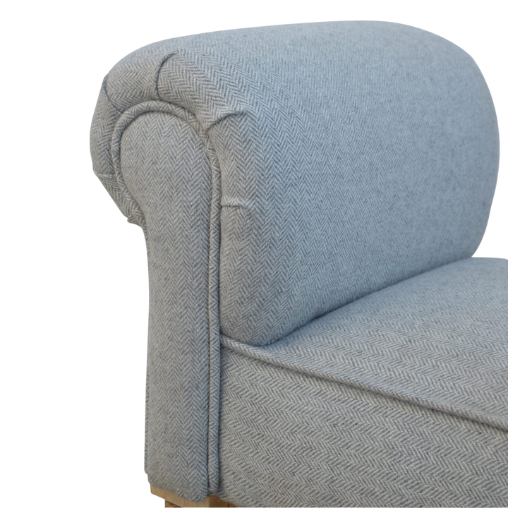 Close view of the rolled arm and upholstery on the Hampstead Roll-Arm Bench in Dove Tweed.