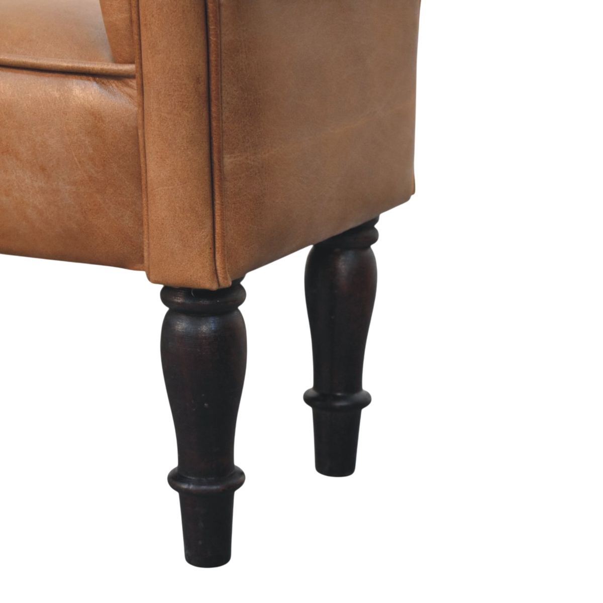 Close view of the turned legs on the Hampstead Roll-Arm Bench in Tobacco Leather.