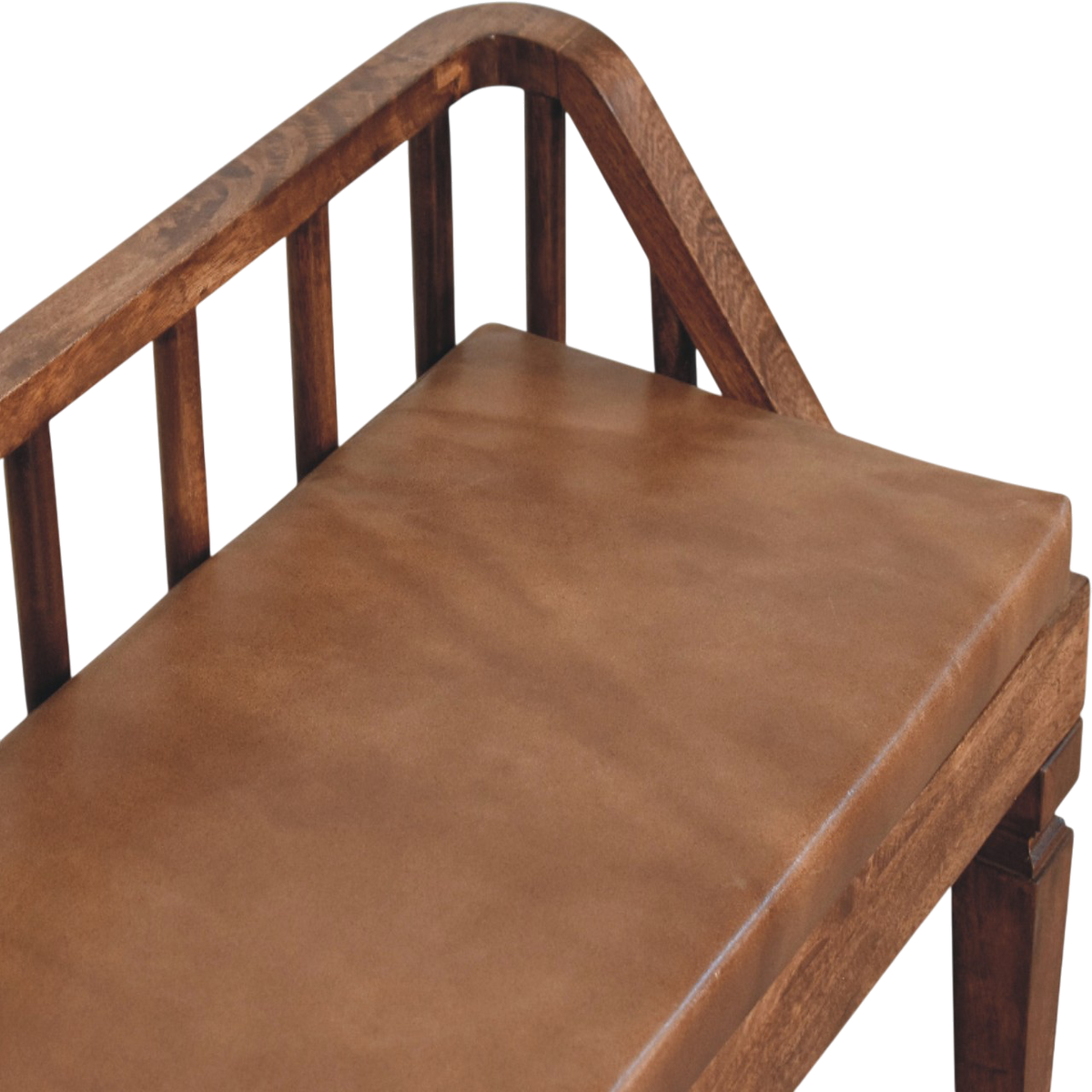 Close view of the upholstered seat on the Kelso Bench in Chestnut with Tobacco Leather.