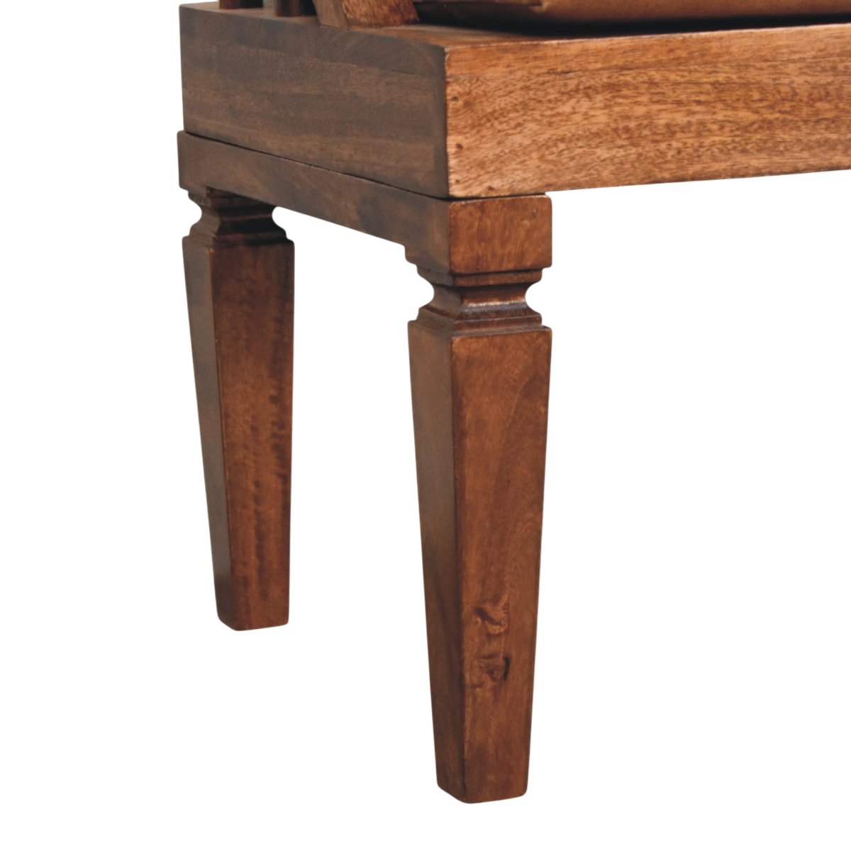 Close view of the turned legs on the Kelso Bench in Chestnut with Tobacco Leather.