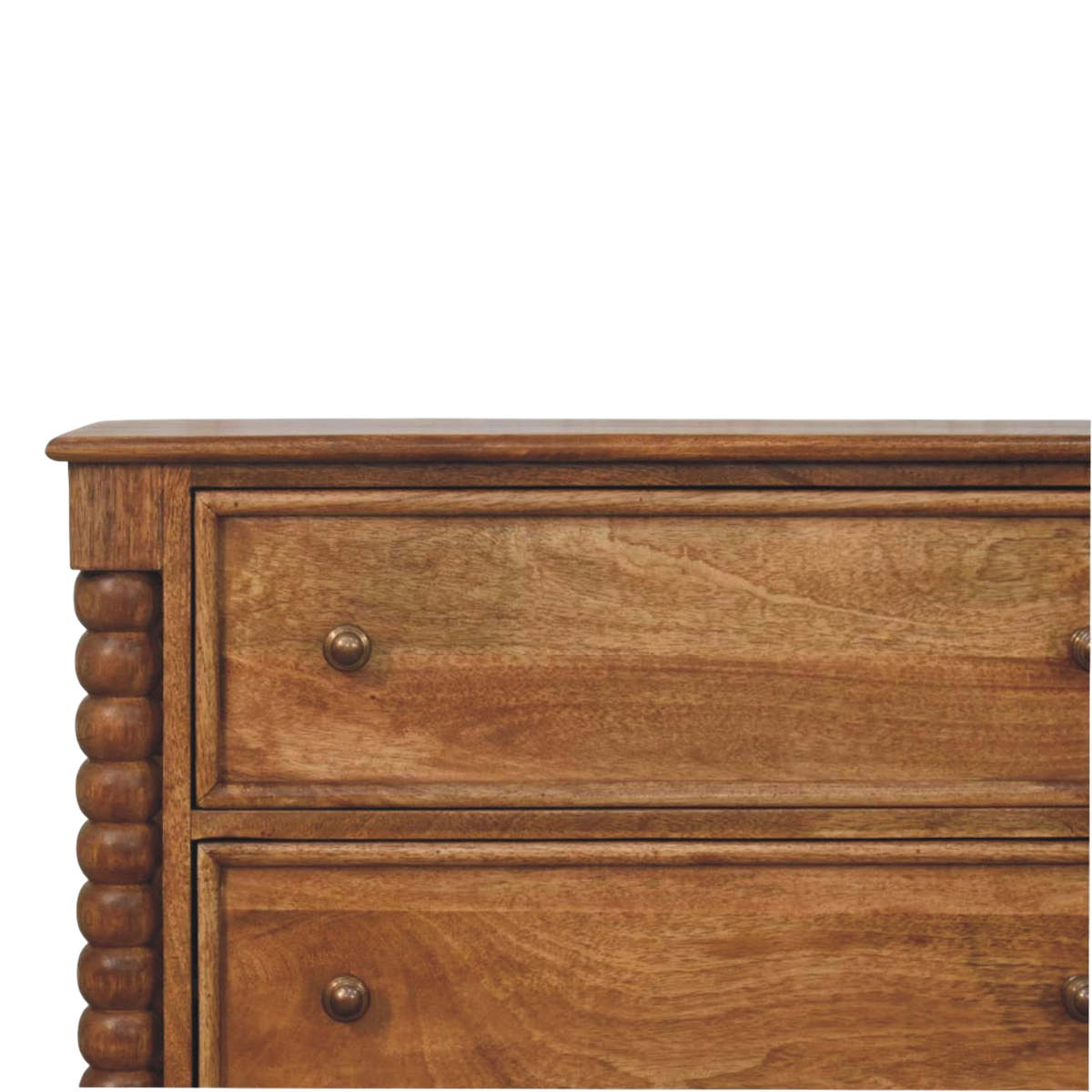 Close view of the knobs on the Langham 3-Drawer Dresser in Amber.