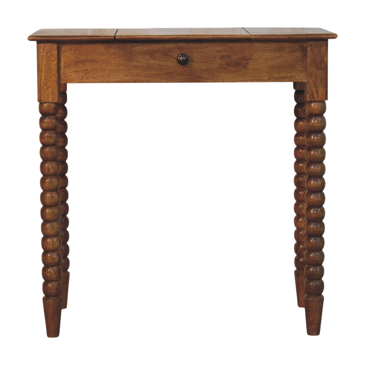 Langham Dressing Table in Amber, front view. Solid hardwood throughout in an amber finish, legs turned in a bobbin pattern.