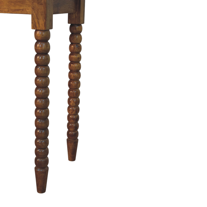 Close view of the bobbin turning on the Langham Dressing Table in Amber.