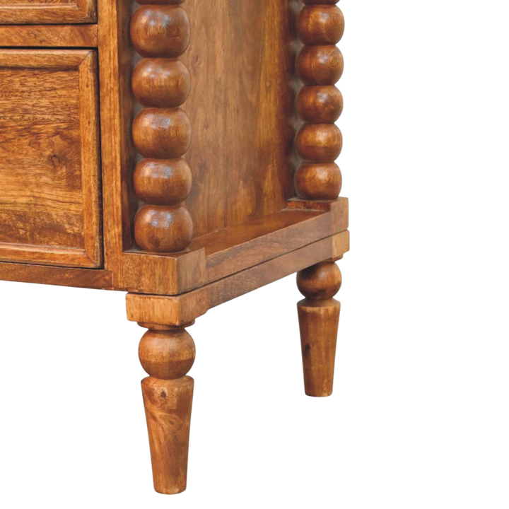 Close view of the legs on the Langham Grand 2-Drawer Bedside Table in Amber.