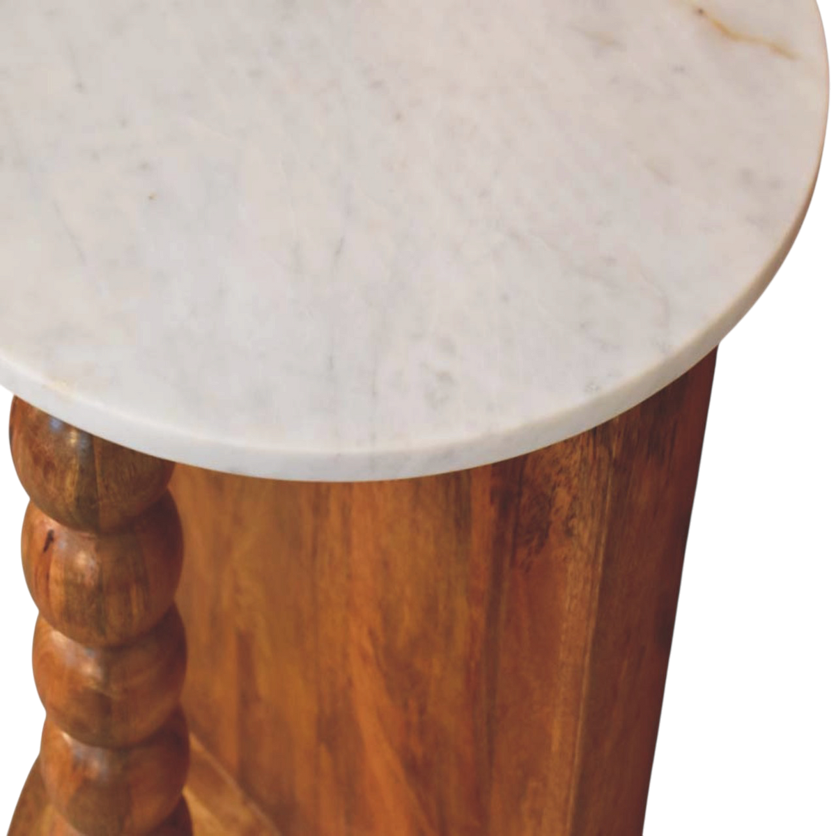 Close view of the top on the Langham Marble Side Table in Amber.