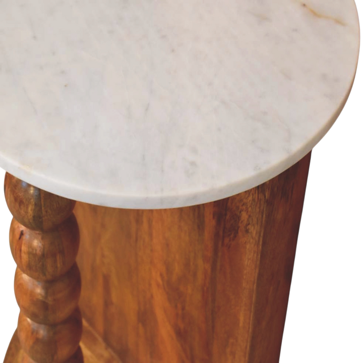 Close view of the top on the Langham Marble Side Table in Amber.