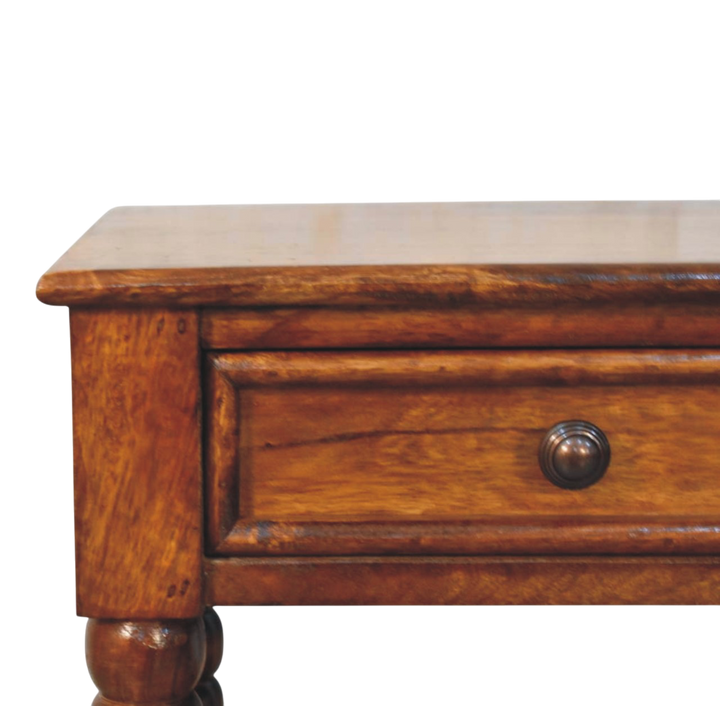 Close view of the drawer front and knob on the Langham Open Bedside Table in Russet.
