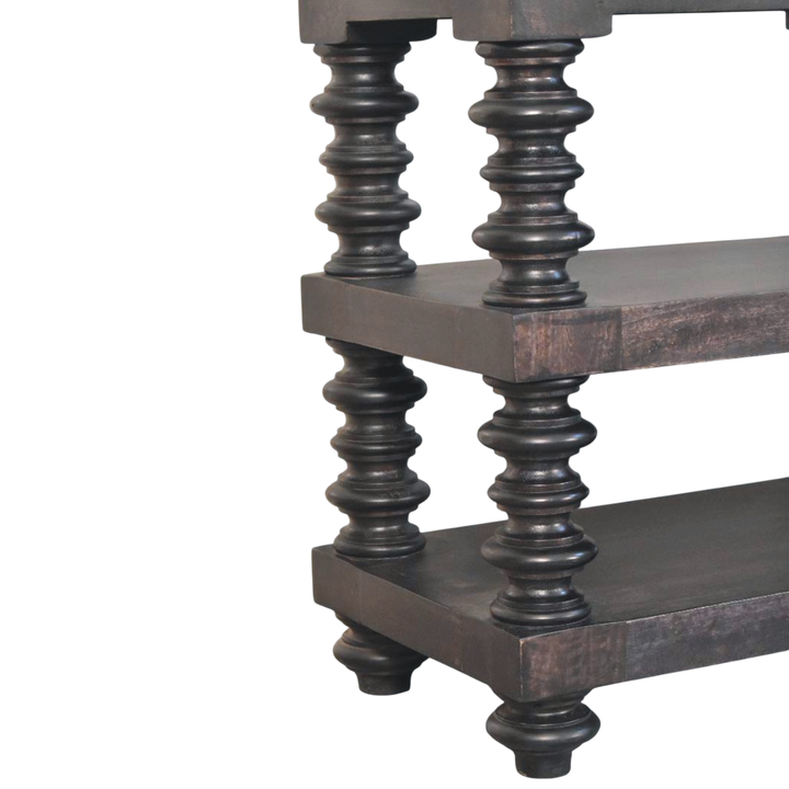 Close view of the bobbin turning on the Langham Open Shelf Console in Charcoal.