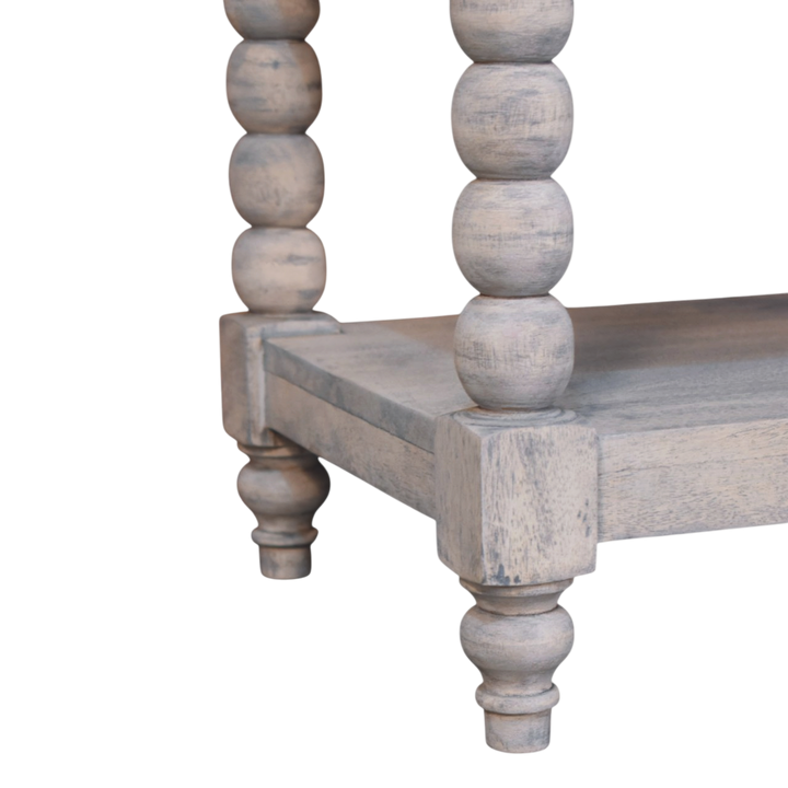 Close view of the bobbin turning on the Langham Open Side Table in Salt.