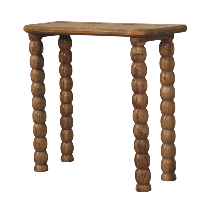 Langham Rattan-Top Console Table in Amber with Natural Rattan, three-quarter view showing the full profile.
