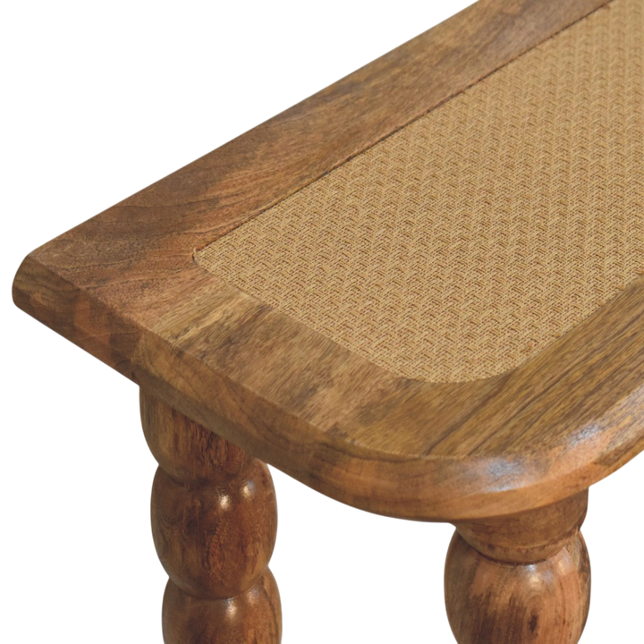 Close view of the woven panels on the Langham Rattan-Top Console Table in Amber with Natural Rattan.