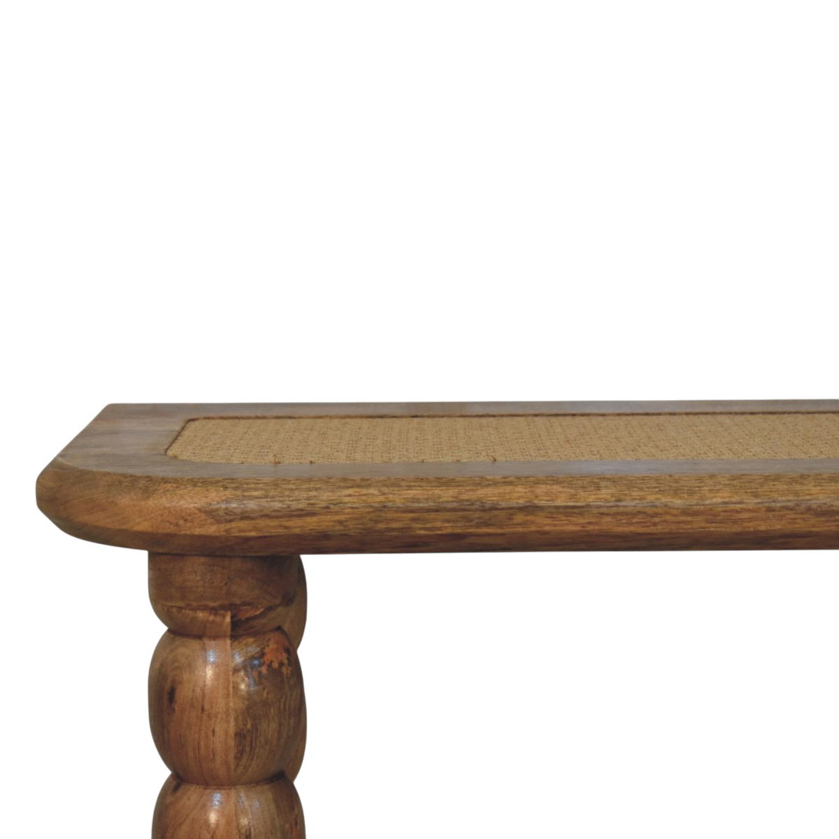 Close view of the legs on the Langham Rattan-Top Console Table in Amber with Natural Rattan.