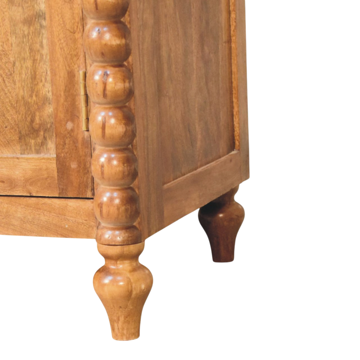 Close view of the bobbin turning on the Langham Sideboard in Amber.
