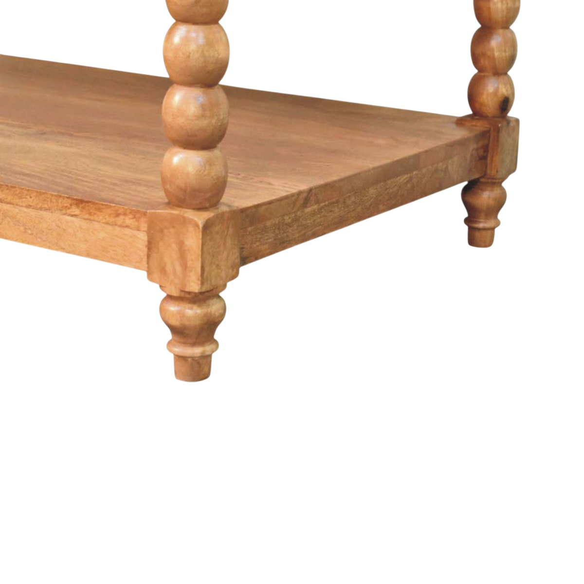 Close view of the bobbin turning on the Langham Spindle Coffee Table in Amber.