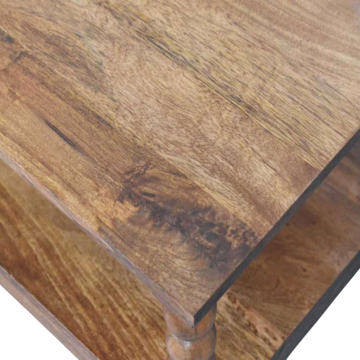 Close view of the top on the Langham Spindle Coffee Table in Amber.