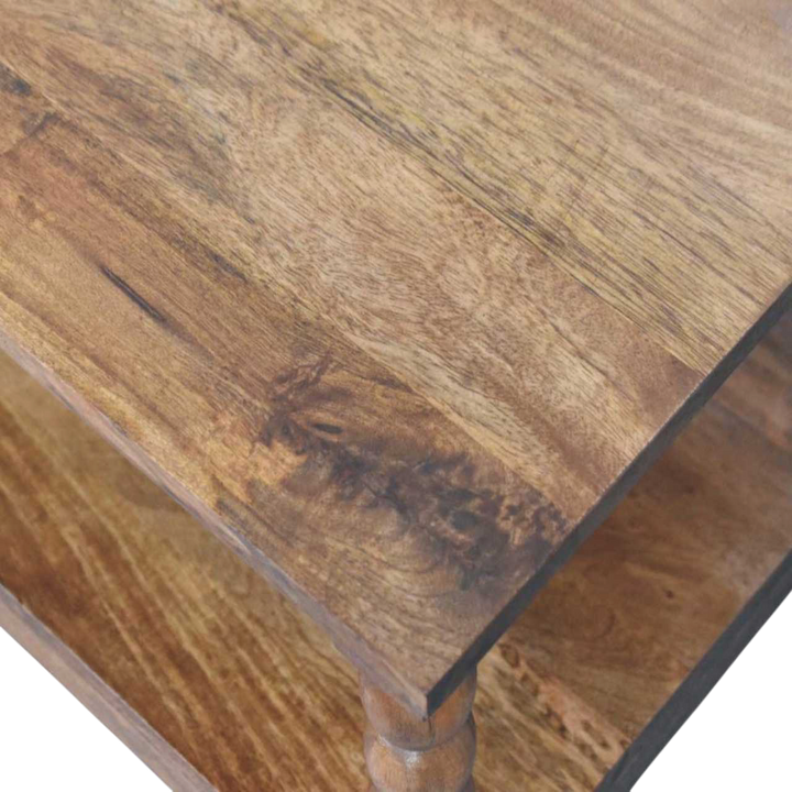 Close view of the top on the Langham Spindle Coffee Table in Amber.