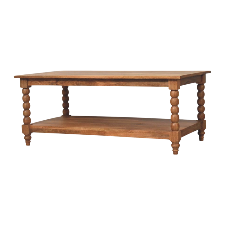 Langham Spindle Coffee Table in Russet, three-quarter view showing the full profile.