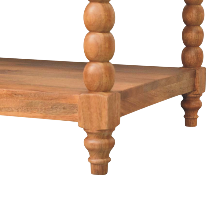 Close view of the bobbin turning on the Langham Spindle Coffee Table in Russet.