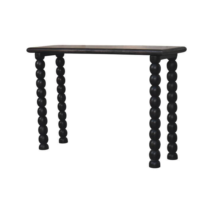 Langham Spindle Console in Charcoal, three-quarter view showing the full profile.